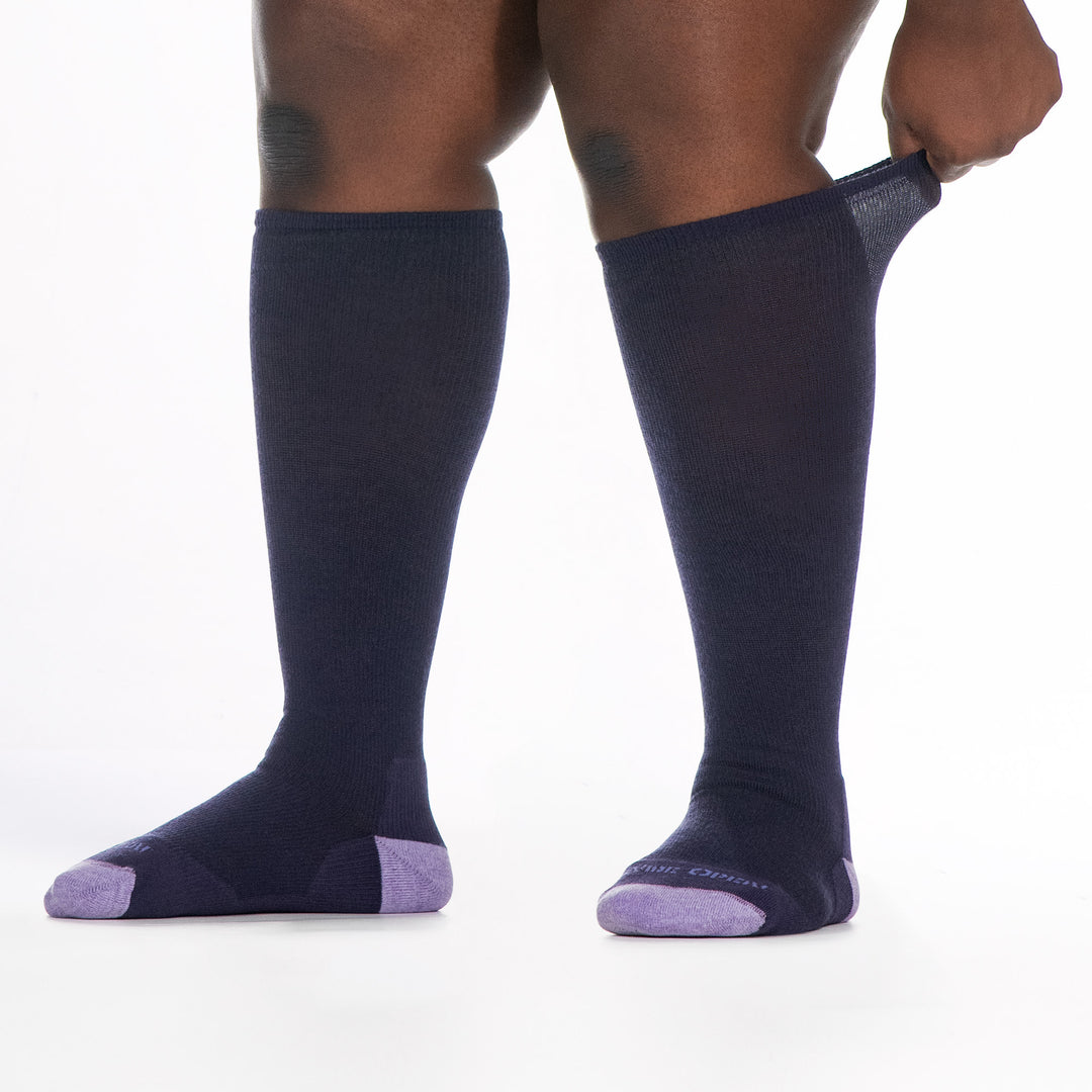 9517 blackberry knee high sock with lavender heel/toe/logo, shown from front and side with feet to the left and back cuff stretched 